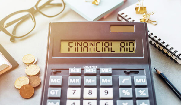 The words "financial aid" are shown on a calculator