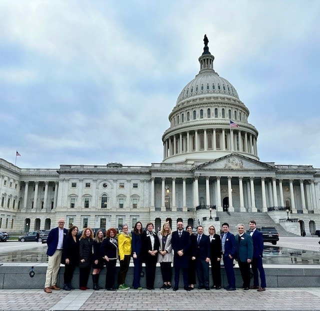 IECA members participating in the 2024 Advocacy Day are shown in front of the US Capitol.