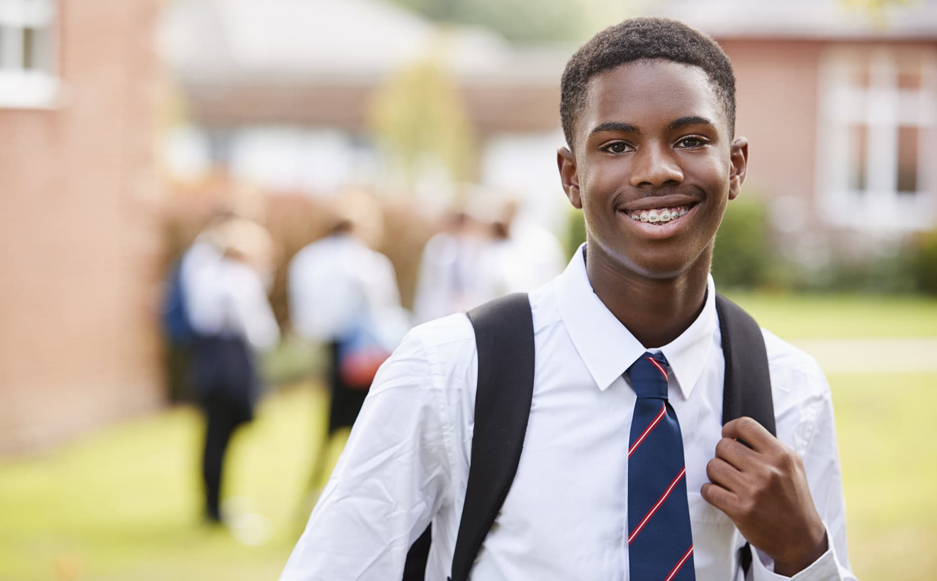 Smiling independent school student