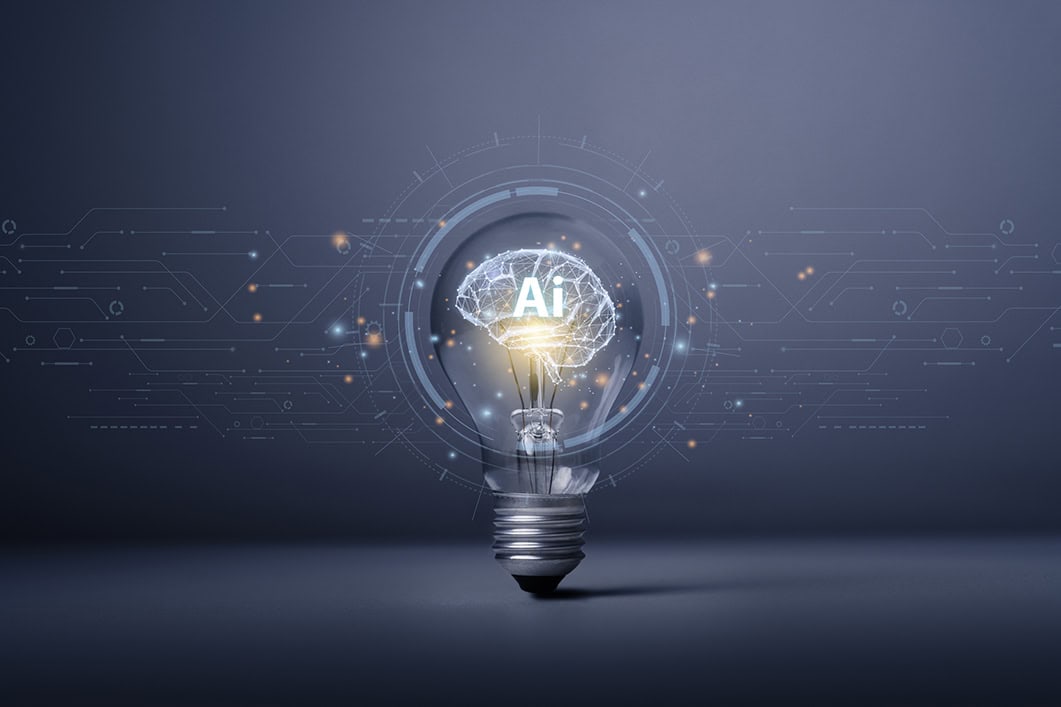 AI concept showing brain with letters AI inside a lightbulb with graphic