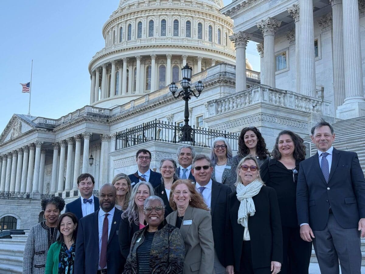 A group of 17 IECA members and IECA CEO Leigh Allen shown in front of the US Capitol during the 2025 IECA Advocacy Day