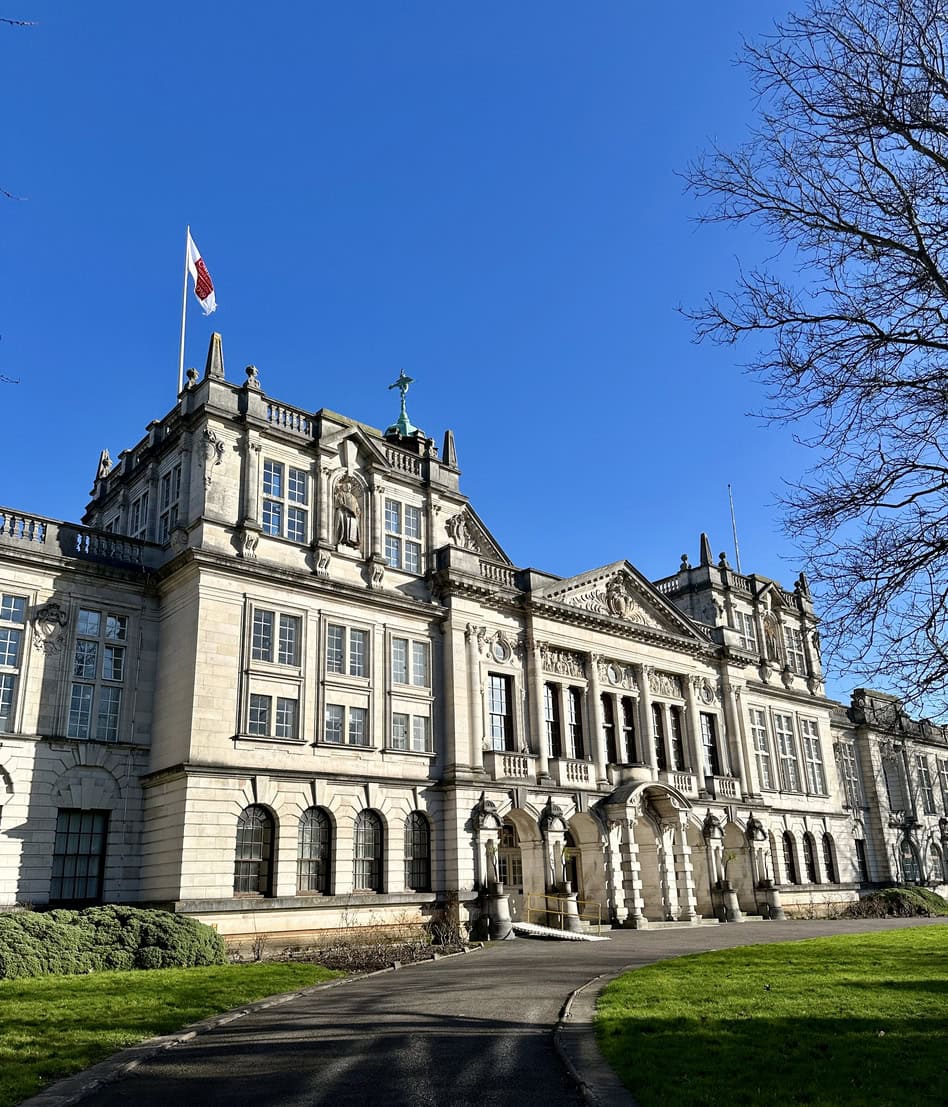 The main university building at Cardiff in Cathays park on a sunny blue sky day. The university is located in the capital city of Wales in the South of the country