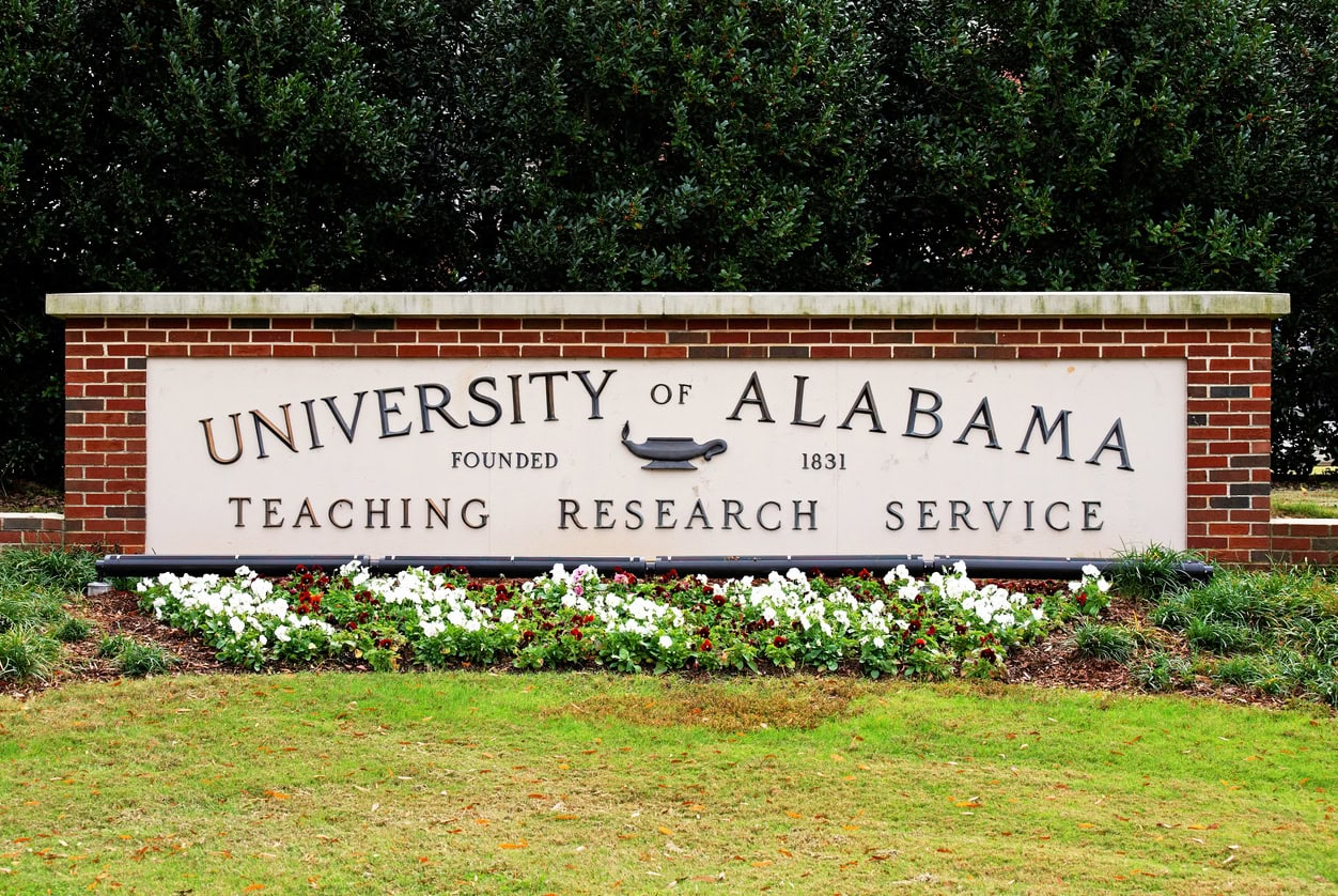 A sign at an entrance to the University of Alabama. The University of Alabama is a public research university located in Tuscaloosa, Alabama.
