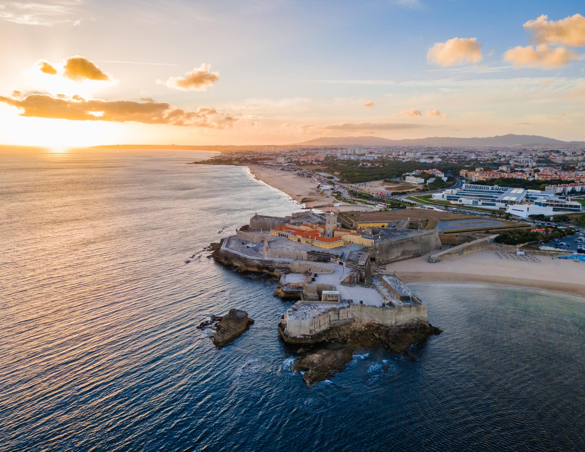 Sao Juliao da Barra fort at Carcavelos beach during sunset