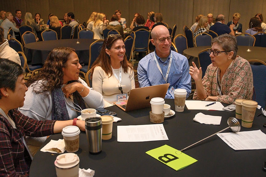 IECA members talk during a conference roundtable session