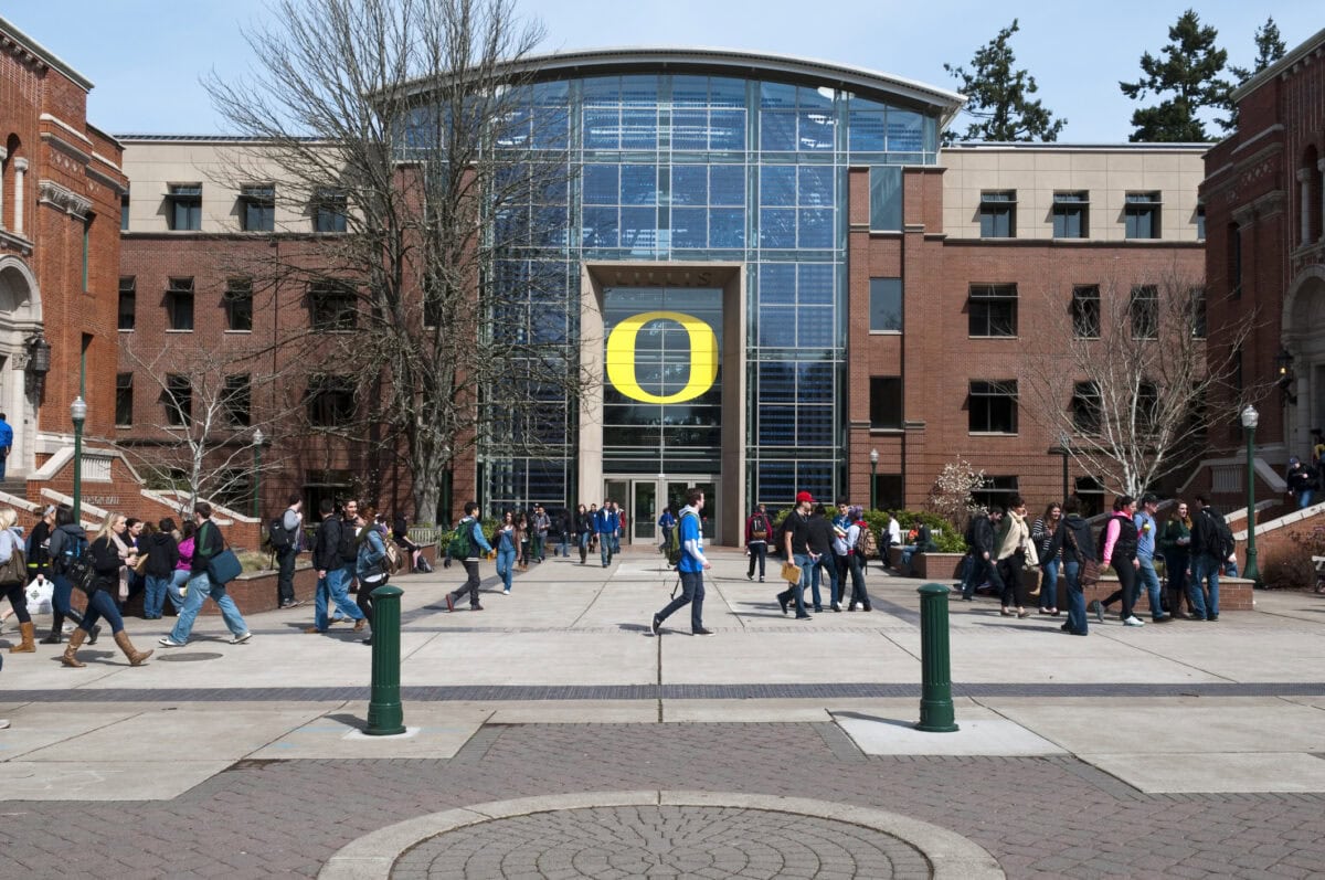 Students walk on the University of Oregon campus in the city of Eugene in April 2012.